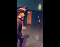 Guy plays boxing game in arcade