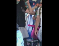 Three guys pink white tutu skirts train 