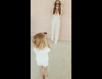 Little girl directs mother photo white dress shoot 