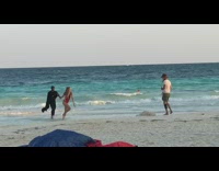 Batman costume beach photoshoot