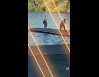 White shoes girl dances dock red shirt