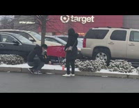 Man takes picture of pink coffee tumbler