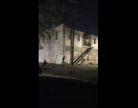 Collab IITW - Woman in white top poses at the stairs with flashes