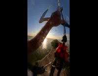 Filmer beach kitesurf and performs trick mid-air Part 1