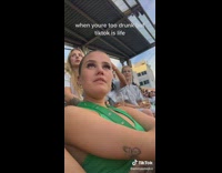 Woman trying to stay awake when drunk