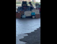 Person with absurd services on signages 