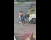 Women twerk in front of car dress