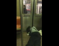 Man passed out on doors of subway