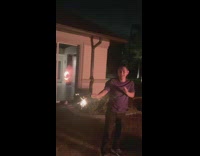 Guy hold fireworks wish to see peter parker