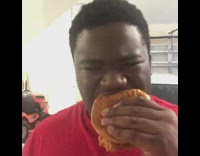 Guy smokes chicken sandwich 