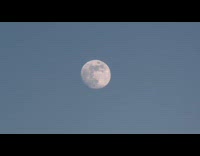 Submitter films clear moon in blue sky