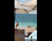 Woman bikini lie down pose at beach