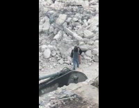 Girl flips hair in front of construction site 