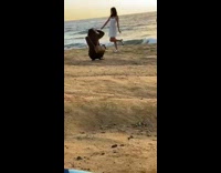 Girl white dress pose at beach sunset