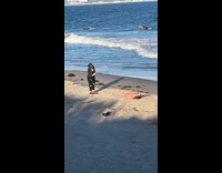 Woman beige bikini sit-ups on the beach