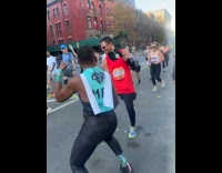 Runners joins woman dance while running marathon