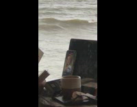Woman tarot cards live stream table beach
