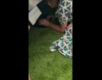 Woman use laptop work under bridge during concert