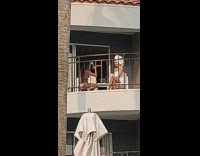 Woman towel body hair sit balcony hotel