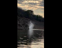 Collab SendItOfficiall - Guy jumps on river swims with friends