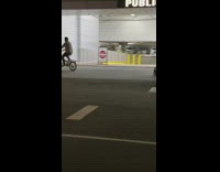 Mom on rollerblades pushes baby stroller sidewalk 