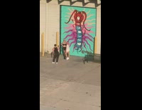 Two girls blue mural worm painting 