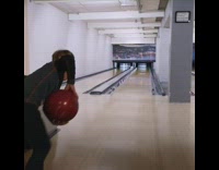 little boy drops red bowling ball gutter