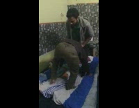 Grey jacket guy jumps on friends head 