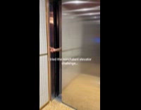 Man does elevator nonchalant challenge