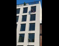 Window cleaner wears spiderman costume at work