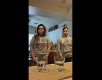 Girl dances with mom spits water