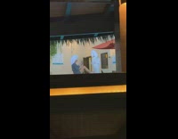 Two women shower robe bar