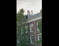 Three people caught filmer dance rooftop