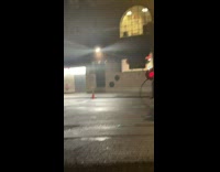 Guy riding big bicycle with a giant wheel