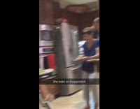 Little girl green woman eats cat