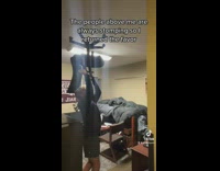 Guy rolls chair on roof for noisy neighbors