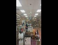 Chandi liquor store woman cant get into store.