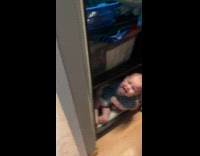 Collab ClipsIG - Two babies crawl and play under cabinet