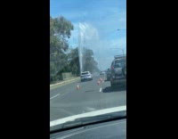 Water bursting from broken water pipe