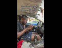 Guy restarts song in car