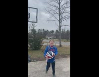 Kid hits a behind the backboard shot at backyard