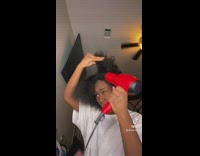 Lady Straightens her Hair then Applies Makeup