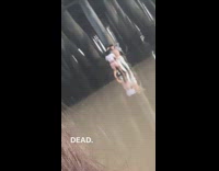 Guy white pants pier pole pose hands on head