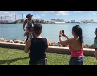 Woman gives shoulder ride to friend picture