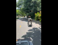Collab WINY - Guy sit on chair on electric skateboard