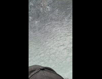 Filmer in car get carwash from fire hydrant