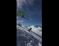 slomo man bright green outfit backflip