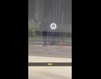 Man Star Wars costume dances gas station