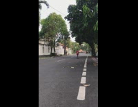 Red shirt little boy falls off scooter 