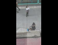 Woman put sunglasses grey skirt street LED